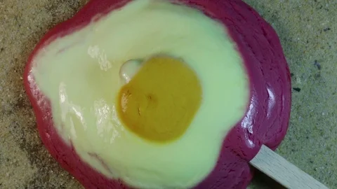 Circular Popsicle Melts on Sand Video stock 75691365