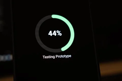 Circular progress ring at 44 percent with Testing Prototype text on a dark Stock Photos