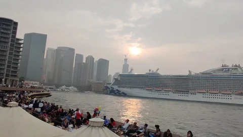 Circular Quay crowds and cruise liner docked in Sydney Harbour, 4K Stock Footage 122489953