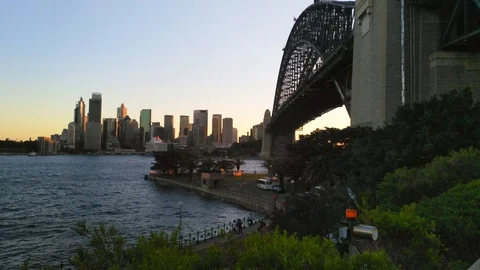 Circular quay, UHD pan view, of the harbor bridge and the opera house, on a s Stock Footage 87628940