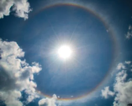 Circular rainbow around sun Foto stock