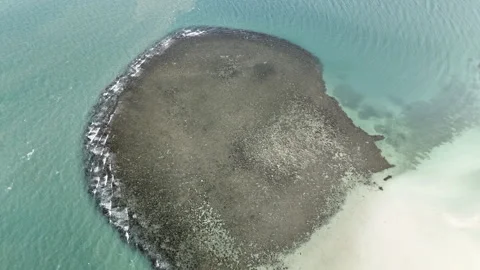 Circular Reef Formation Surrounded by Shallow Tropical Lagoon. Stock Footage 340681507
