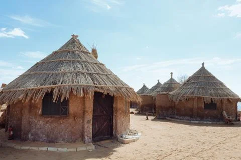 A circular rest area made of mud bricks and reeds Stock Photos