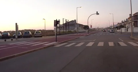 Circular on the road at the end of the day by the beach - conduzir junto a praia Stock Footage 77724108