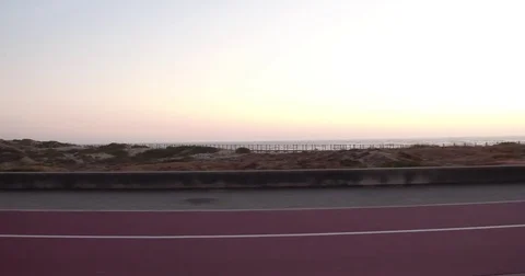 Circular on the road at the end of the day - Circular na estrada ao fim do dia Stock Footage 77724064