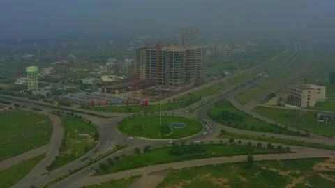Circular road top view at the city in india Stock Footage 221736669