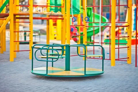 Circular rotational swing on the playground 库存照片