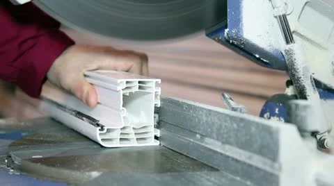 Circular Saw Blade Cutting PVC Window Profile Stock Footage 20615809