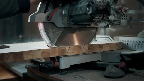Circular Saw. Carpenter Using Circular Saw for wood Stock Footage 142250713