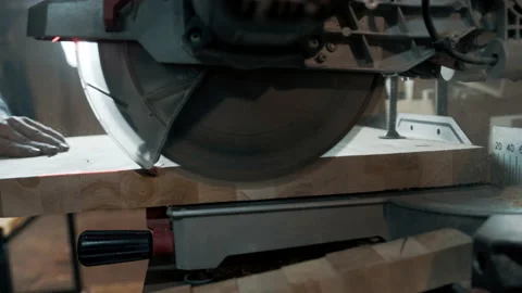 Circular Saw. Carpenter Using Circular Saw for wood Stock Footage 142250855