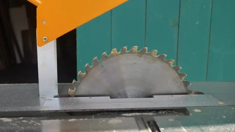 Circular saw in carpentry workshop. Circular table saw for cutting wood. Circula Stock Footage 296903887
