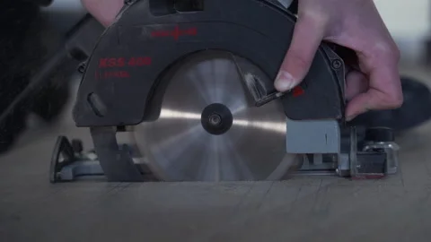 A circular saw cuts a board Video stock 149127287