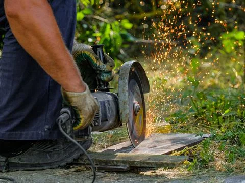 Circular saw cuts metal Stock Photos