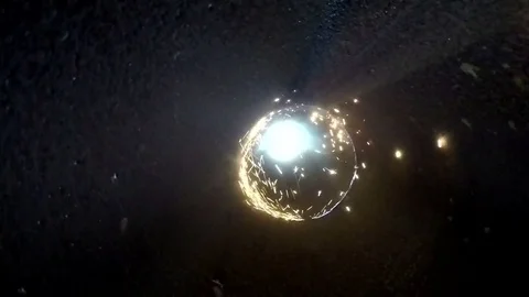 Circular saw cuts a metal pipe. The camera resumes from the inside of the tube. Stock Footage 71342899