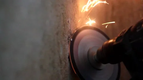 Circular saw cuts a nail in the wall Stock Footage 154248448