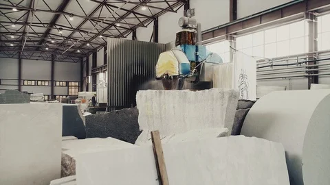 Circular saw cutting of Huge stone block. Granite processing in manufacturing. Video stock 106448849