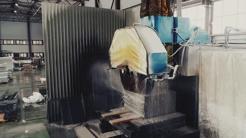 Circular saw cutting of Huge stone block. Granite processing in manufacturing. Video stock 106448987