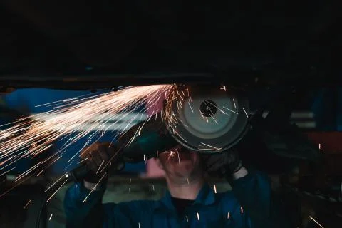 Circular saw cutting steel with split fire. Stock-Fotos