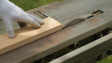 A circular saw. Cutting wood on a circular saw. Circular sawing Stock Footage 109056397