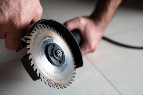 Circular Saw Disc Close-up on Angle Grinder. Blade Detail Stock Photos