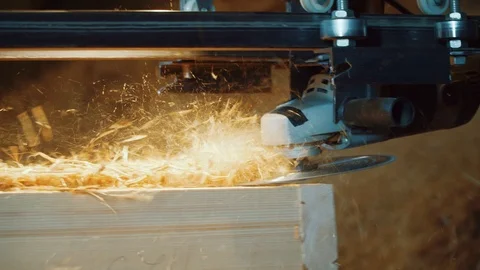 A circular saw grinds a straw block panel Stock Footage 126775500