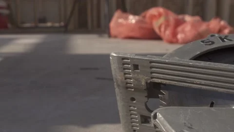 A Circular saw laying on the cement Stock Footage 137971830