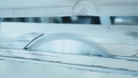 Circular saw machine starts Stock Footage 104497579