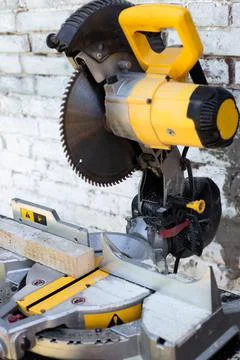 Circular saw with a sharp saw. Making furniture with a professional tool Photos