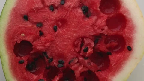 Circular scooping pattern in fresh watermelon ASMR therapy Stock Footage 314268572