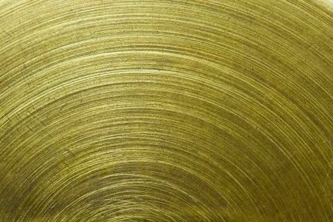 Circular scratch on gold metal Stock Photos