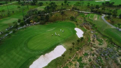 A circular shot of people playing golf Stock Footage 242094876