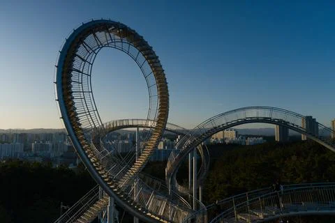 Circular Skywalk Structure At Sunset Stock Photos