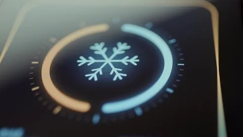 Circular snowflake cooling control dial interface Stock Photos