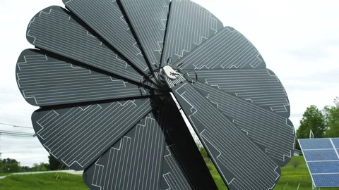 A circular solar panel on a cloudy day Stock Footage 130754357