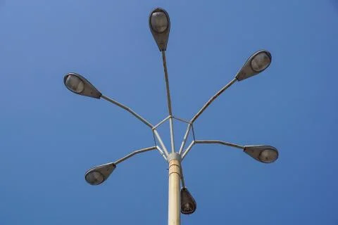 Circular street light. View of a lightpost from below 写真素材
