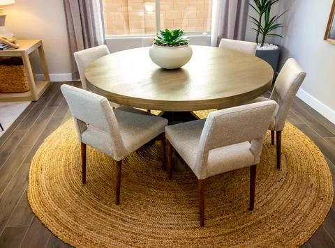 Circular Table With Five Padded Chairs Photos