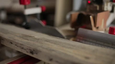 Circular table saw cutting wood in carpenter workshop Stock Footage 59938645