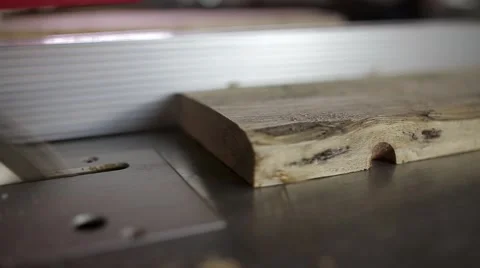Circular table saw cutting wood in carpenter workshop Stock Footage 59939349