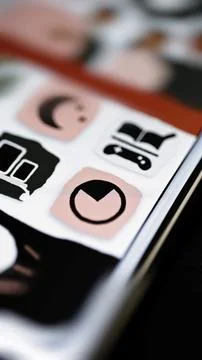 Circular time chart on pink dashboard tile Photos