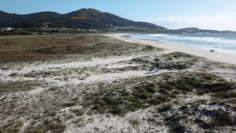 CIRCULAR TRAVELING THROUGH THE BEACH AND THE SEA DRONE Stock Footage 90132870