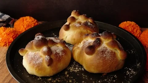 Circular tray with homemade bread of the dead, hojaldras from Mexico Stock Footage 281460118