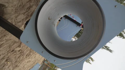 Circular tunnel structure part of playground on sand Stock Footage 306453344
