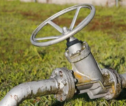 Circular valve actuator for underground pipelines in multi-utility industri.. Stock Photos