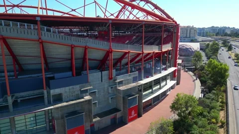 Circular view from the outside of the Sport Lisboa e Benfica stadium at a sunny Stock Footage 318458504