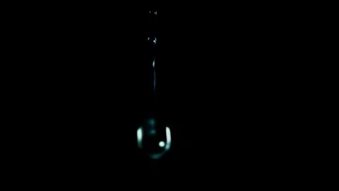 Circular Water Drop Falling On Black Background Video stock 339300947