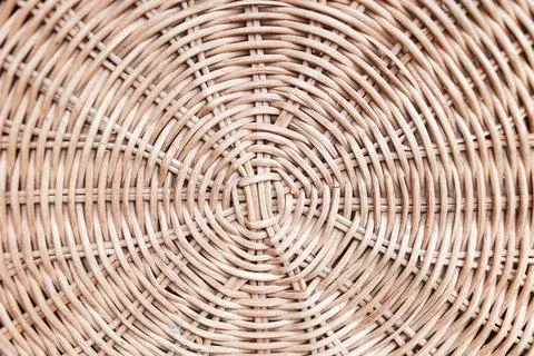 Circular weave rattan pattern, round rattan furniture background light brown Stock Photos