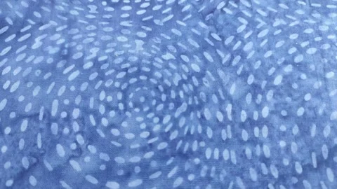 Circular white dots on dark blue fabric Stock Footage 260202280