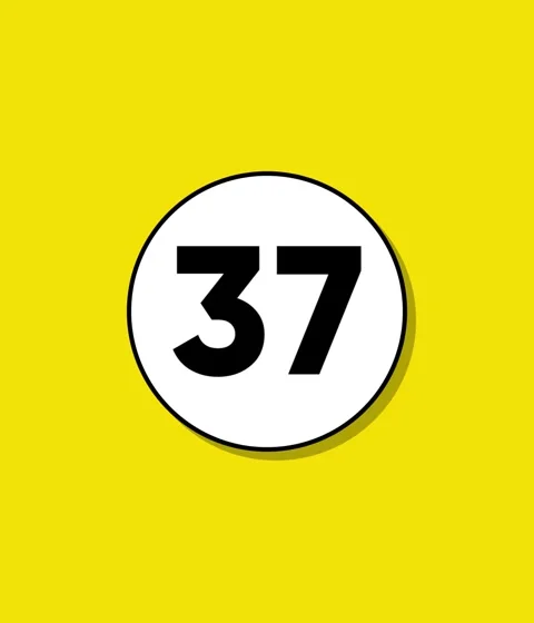 A circular white graphic with a black outline and shadow on a bright yellow.. Stock Footage 332396455