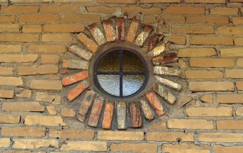 Circular window with brickwork on an old building. photo taken in the mission Stock Photos