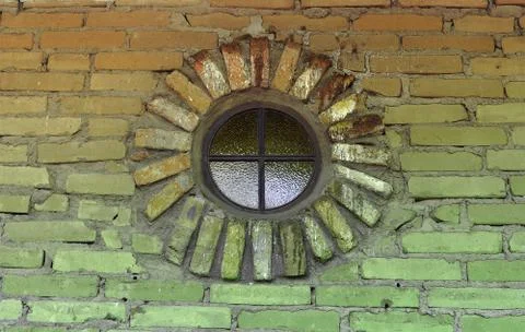 Circular window with brickwork on an old building. photo taken in the mission Stock Photos